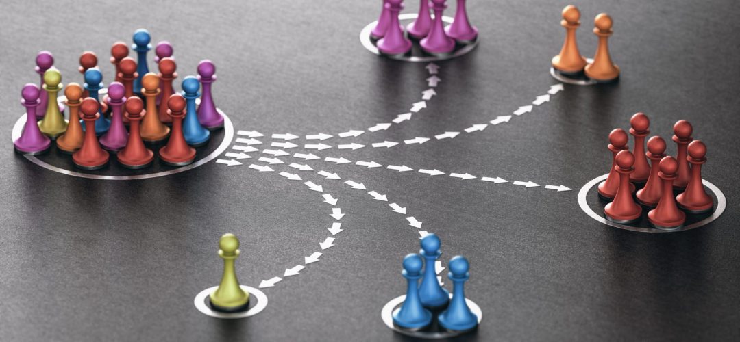 3D illustration of many pawns segmented in different categories over black background. concept of customer segmentation.
